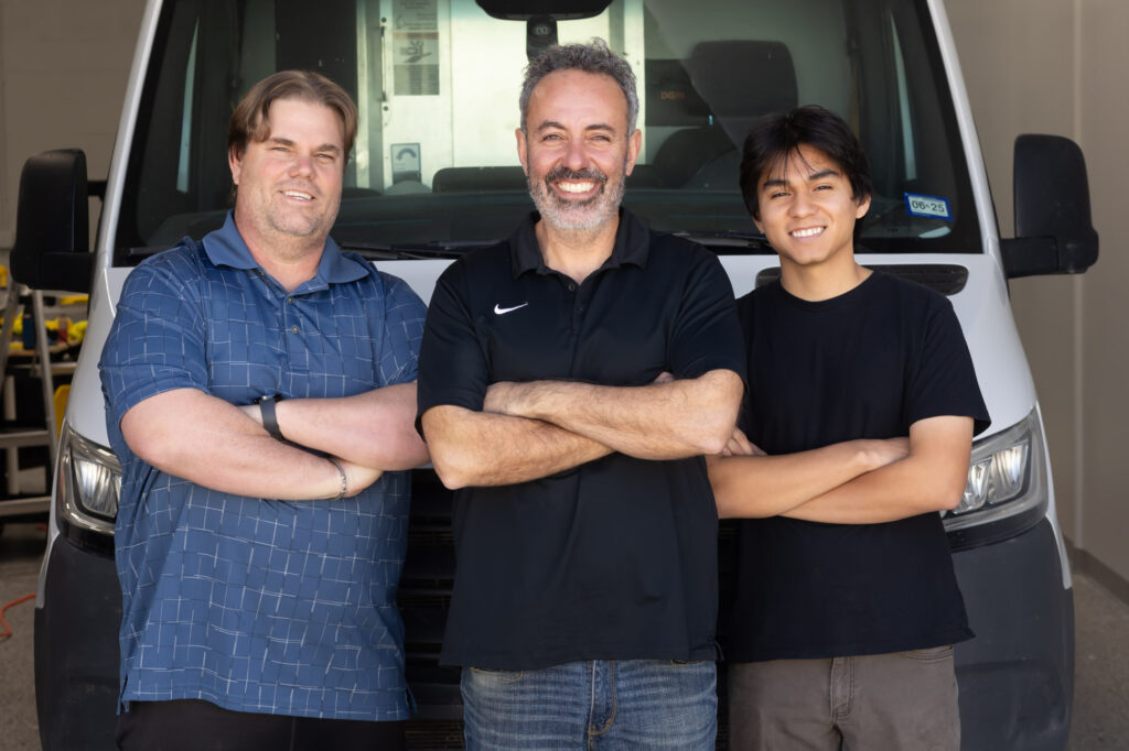 Classic Pinstriping team picture featuring three team members